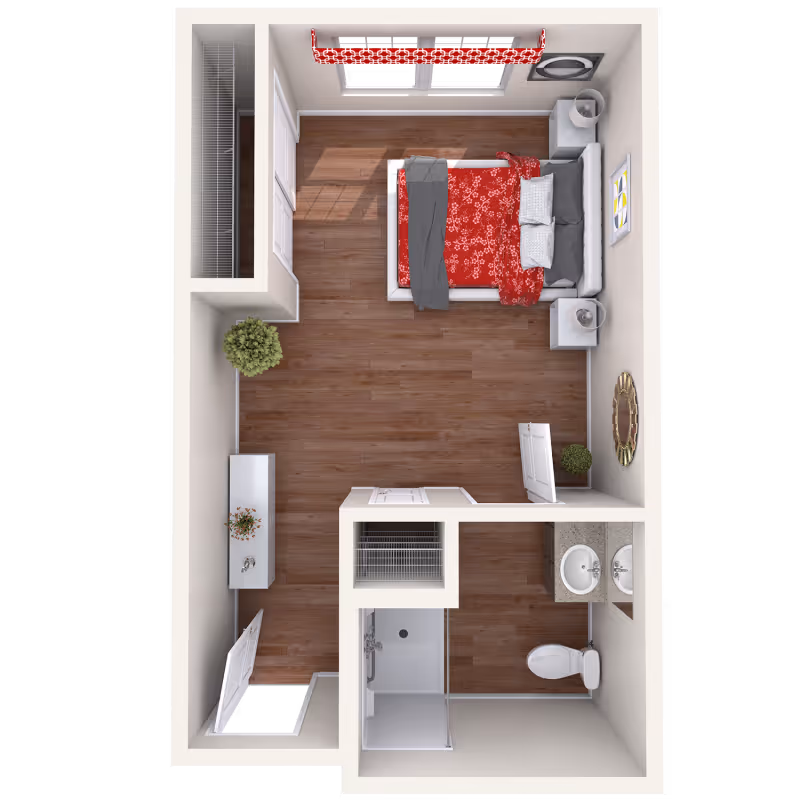 Top-down view of a senior living facility bedroom with a bed covered in red floral bedding, two nightstands with lamps, a window with red patterned curtains, a closet, a small dresser with a plant, and an attached bathroom with a shower, toilet, and double sink vanity.