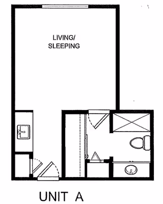 Black and white floor plan labeled Unit A showing a combined living and sleeping area, a small kitchenette with a sink, and a bathroom with a toilet and sink.