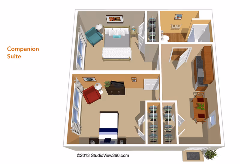 3D floor plan of a companion suite featuring two separate bedrooms, each with a bed, chair, and nightstand. The suite includes a shared bathroom with a shower and a kitchen area with cabinets, a dining table, and chairs. There are closets between the bedrooms and the kitchen area.