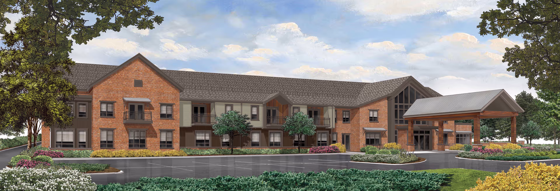 Brick senior living building with a covered entrance and manicured landscaping.