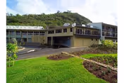 Exterior view of Palolo Chinese Home Lani Booth showing the building and landscaped grounds.