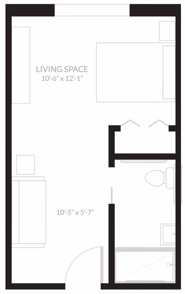 Floor plan layout showing a living space measuring 10 feet 6 inches by 12 feet 1 inch, with adjacent areas including a bathroom with a toilet and shower, and an entry area measuring 10 feet 5 inches by 5 feet 7 inches.