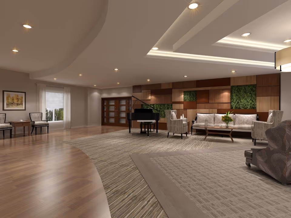 A spacious and elegant living room area with wooden flooring and a large rug. The room features a black grand piano, a seating area with a sofa, armchairs, and a coffee table with a flower arrangement. The back wall has a decorative wood panel design with green plant accents. There are recessed ceiling lights and a large window with white curtains letting in natural light.