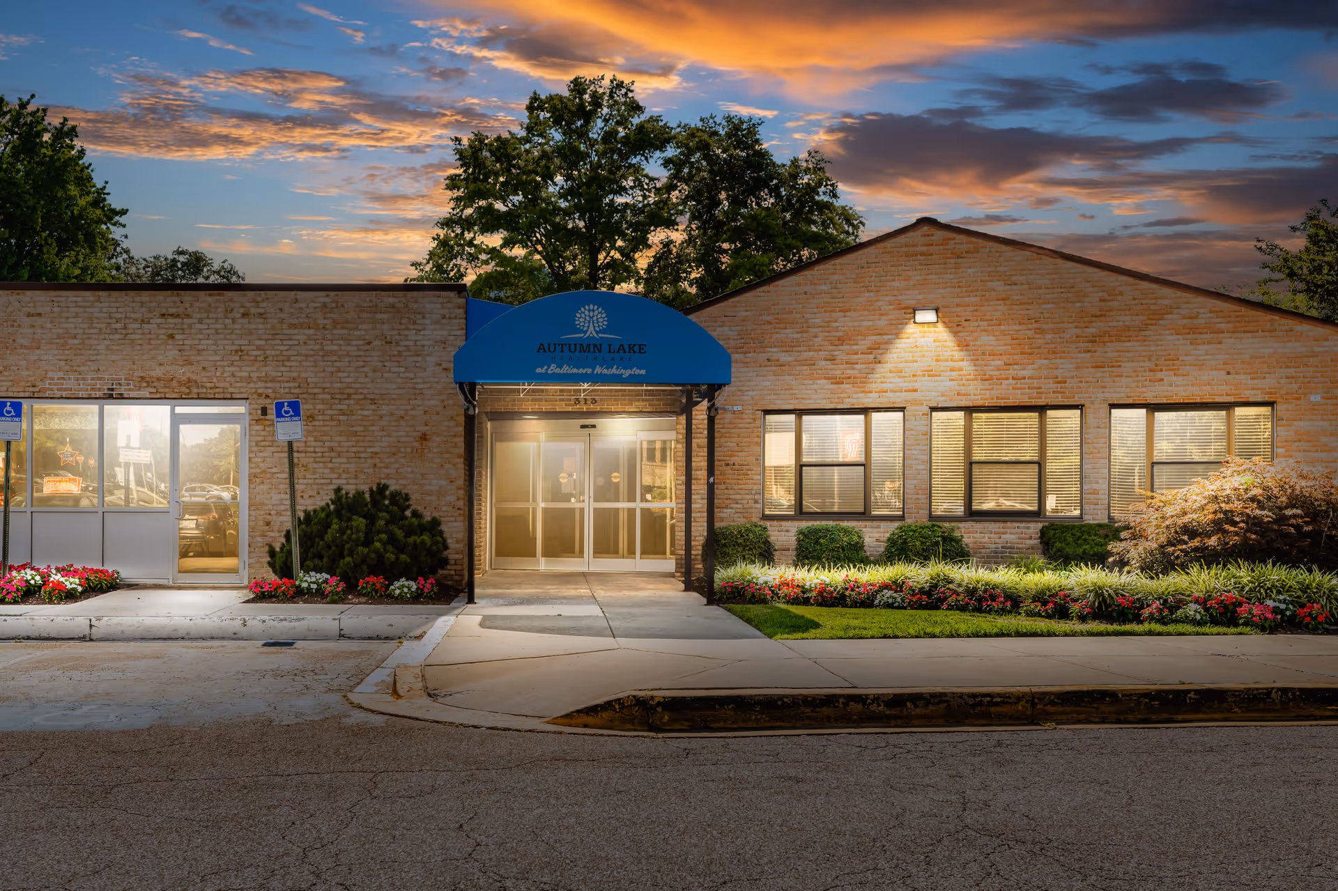 Entrance of Autumn Lake Healthcare at Baltimore Washington facility with landscaping and signage.