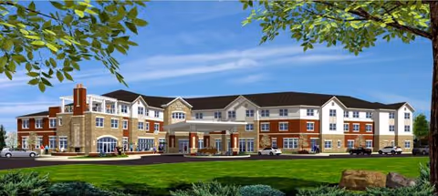 Exterior view of Vista Springs Trillium Village building with a manicured lawn and entrance.