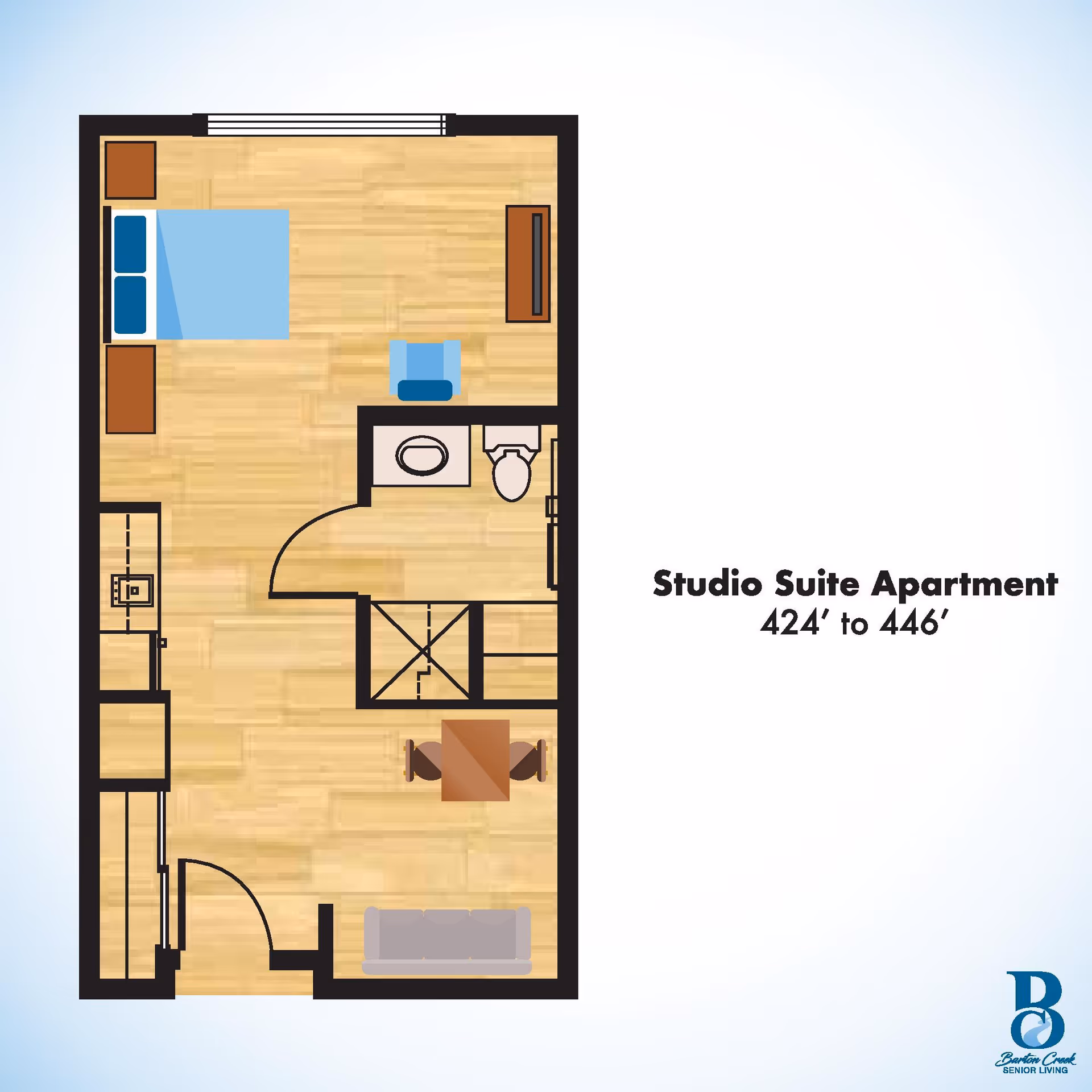 Floor plan of a studio suite apartment showing a combined living and sleeping area with a bed, chair, sofa, dining table with two chairs, a kitchenette, and a bathroom with a toilet and sink.