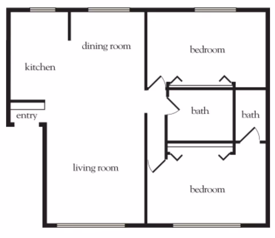Floor plan layout showing an entry leading to a kitchen and dining room, a living room, two bedrooms, and two bathrooms.