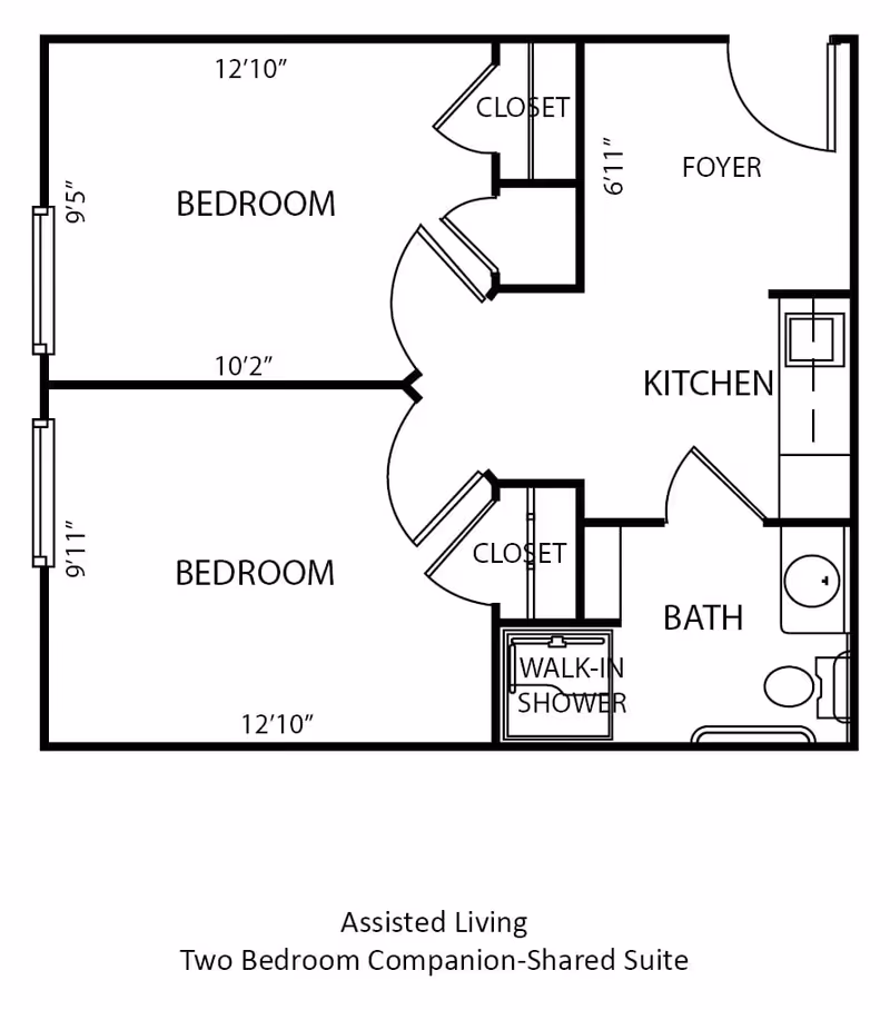 Floor plan of an assisted living two-bedroom companion-shared suite showing two bedrooms, each with a closet, a foyer, kitchen, bathroom with walk-in shower, and closets near the entrance.