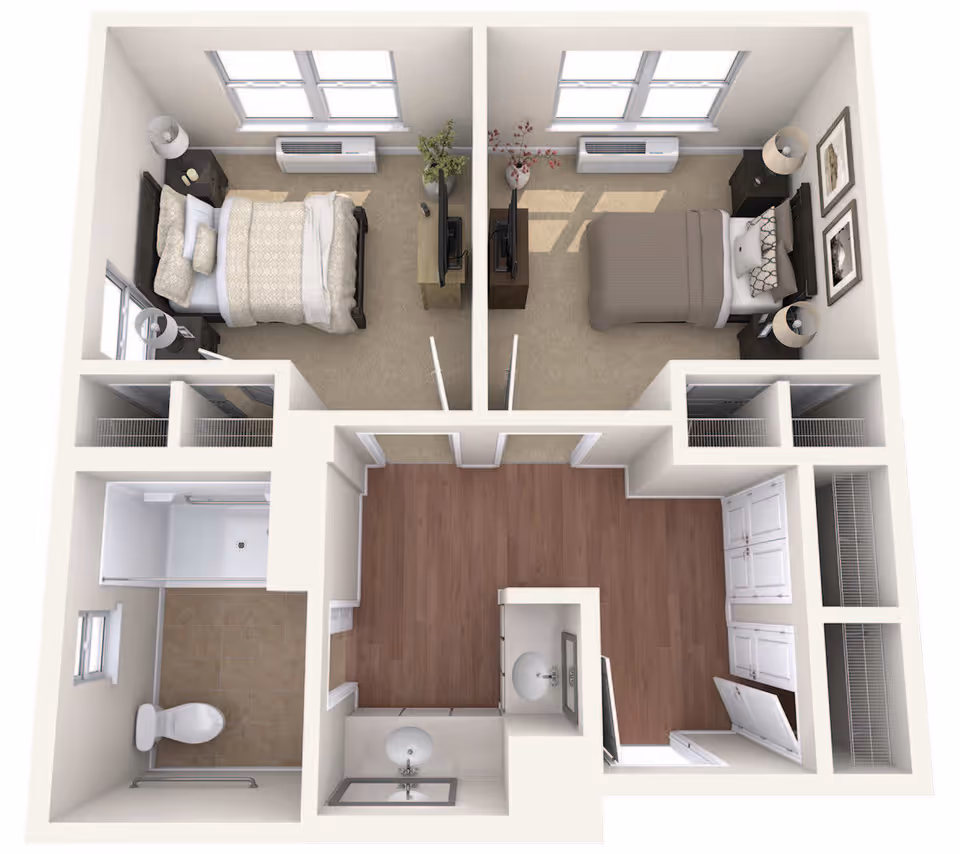 3D floor plan of a senior living apartment featuring two bedrooms each with a bed, nightstands, and a TV. The layout includes a bathroom with a toilet and shower, a kitchen area with cabinets and a sink, and closets for storage.