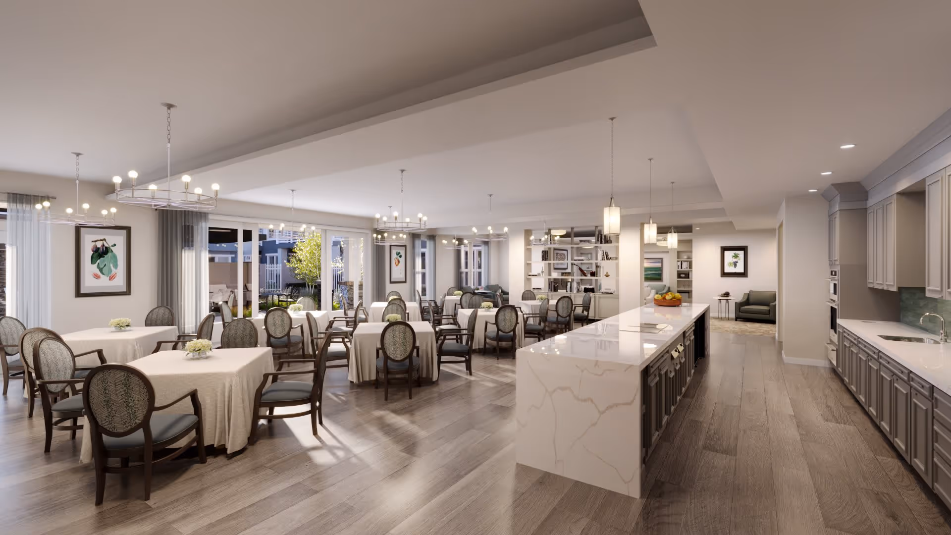 Spacious dining room and open kitchen area with multiple round tables, chairs, and a long central island in a senior living facility.