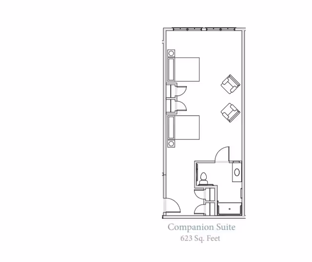 Floor plan of a companion suite at Grand Brook Memory Care of Fishers, showing two beds, two chairs, a bathroom with a toilet, sink, and shower, and a total area of 623 square feet.