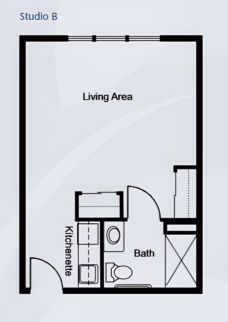 Floor plan labeled Studio B showing a living area, kitchenette, and bath. The kitchenette is located near the entrance, and the bath includes a toilet and shower.
