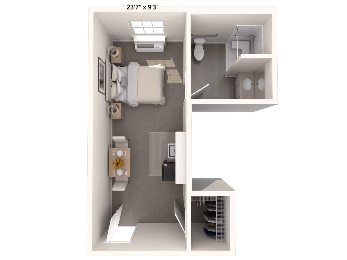 3D floor plan of a small studio apartment featuring a bedroom area with a bed, two nightstands, and a window. Adjacent to the bedroom is a dining table with two chairs. The kitchen area includes a countertop with a sink and appliances. There is a bathroom with a toilet, shower, and double sink. A closet with hanging clothes is located near the entrance.