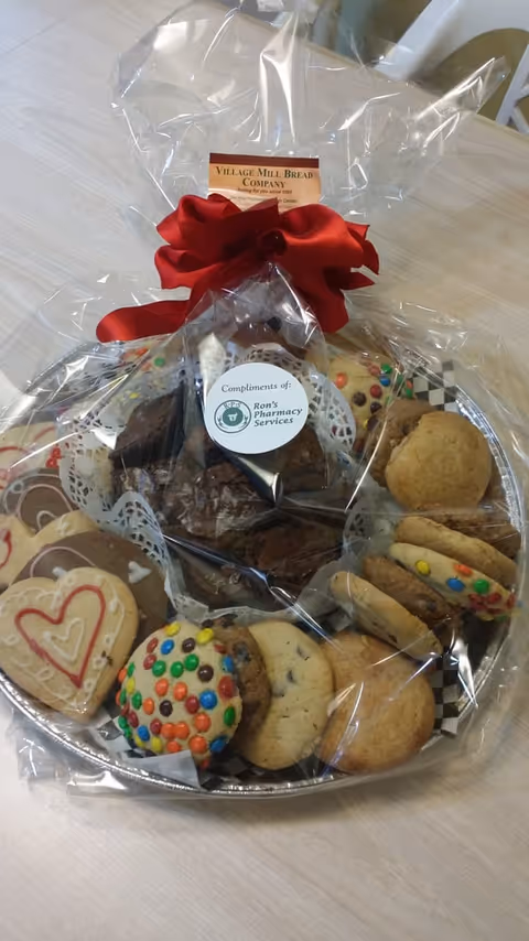 Indoor gift basket of cookies and treats on a table at Bosworth Gardens RCFE II