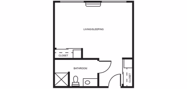 Floor plan of a studio apartment at Barathaven Alzheimer's Special Care Center showing a combined living and sleeping area, a bathroom with a shower, toilet, and sink, and two closets.