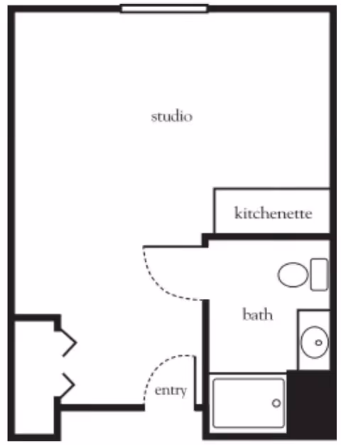 Floor plan of a studio apartment featuring an entry area, a kitchenette, a bathroom with a toilet, sink, and bathtub, and a main studio living space.