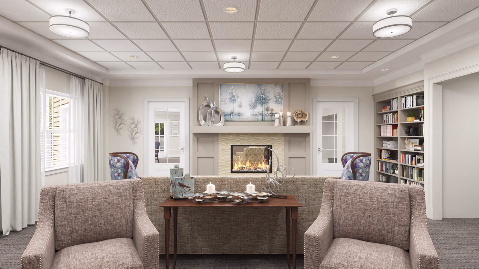 A cozy living room with two upholstered armchairs in the foreground, a sofa with decorative items on a wooden table behind it, a fireplace with a fire burning, and a painting above the mantel. There are two glass-paneled doors on either side of the fireplace, a bookshelf filled with books on the right, and large windows with curtains on the left.