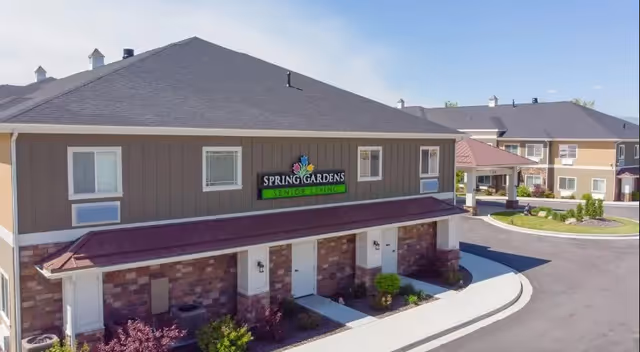 Exterior view of Spring Gardens Senior Living Lindon facility building.