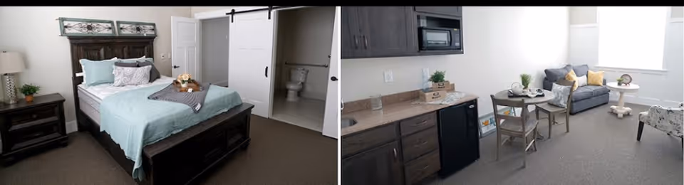 A split image showing two areas of a senior living residence. On the left, a bedroom with a dark wooden bed frame, light blue bedding, pillows, a nightstand with a lamp and plant, and an open door revealing a bathroom with a toilet. On the right, a small kitchenette with dark cabinets, a microwave, mini fridge, and a counter with decorative items, adjacent to a living area with a gray sofa, two chairs, a small round dining table with place settings, and a window letting in natural light.