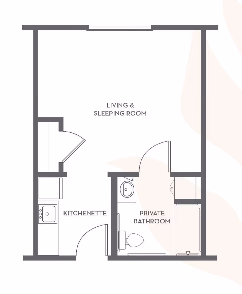 Floor plan layout showing a living and sleeping room, a kitchenette, and a private bathroom with a toilet, sink, and shower area.