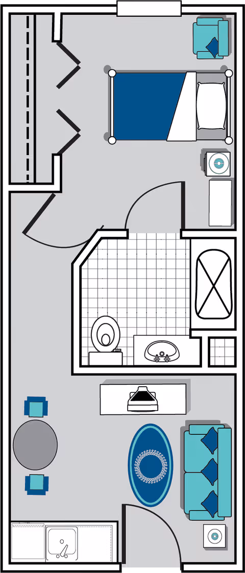 Floor plan of a senior living facility unit at Oaks at Savannah showing a layout with a bedroom containing a bed, armchair, and nightstand; a bathroom with a toilet, sink, and bathtub; a living room area with a sofa, coffee table, two chairs, and a TV stand; and a small kitchenette with a sink.