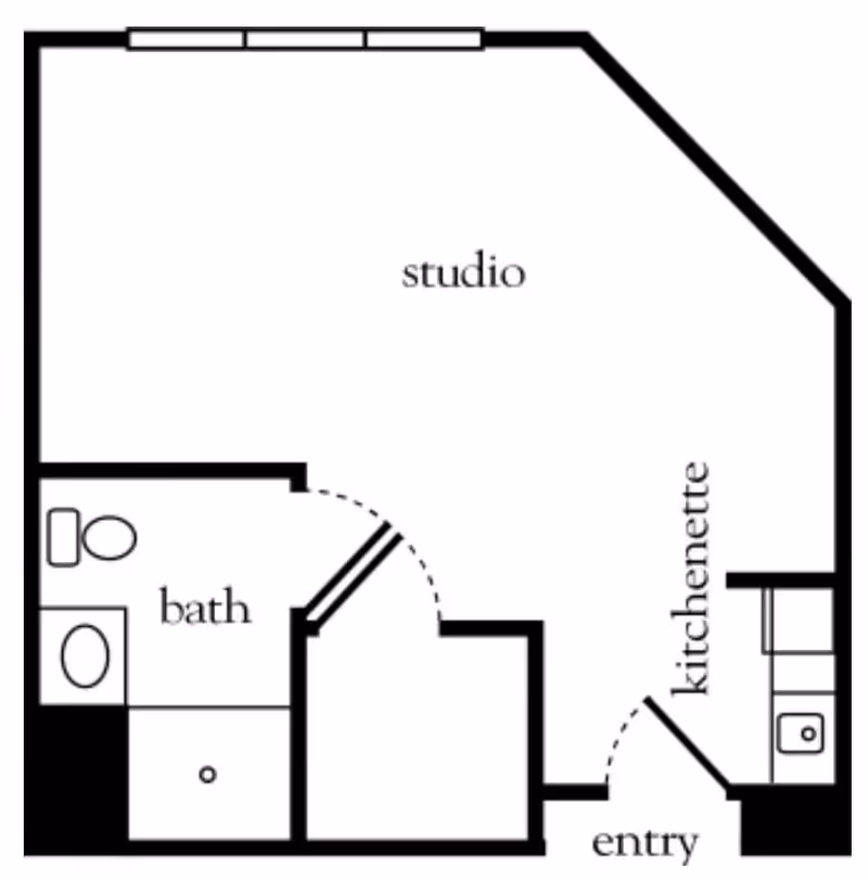 Floor plan of a studio apartment at Atria Merrimack Place showing a studio living area, a bath with toilet and sink, a kitchenette with a sink and counter, and an entry area.