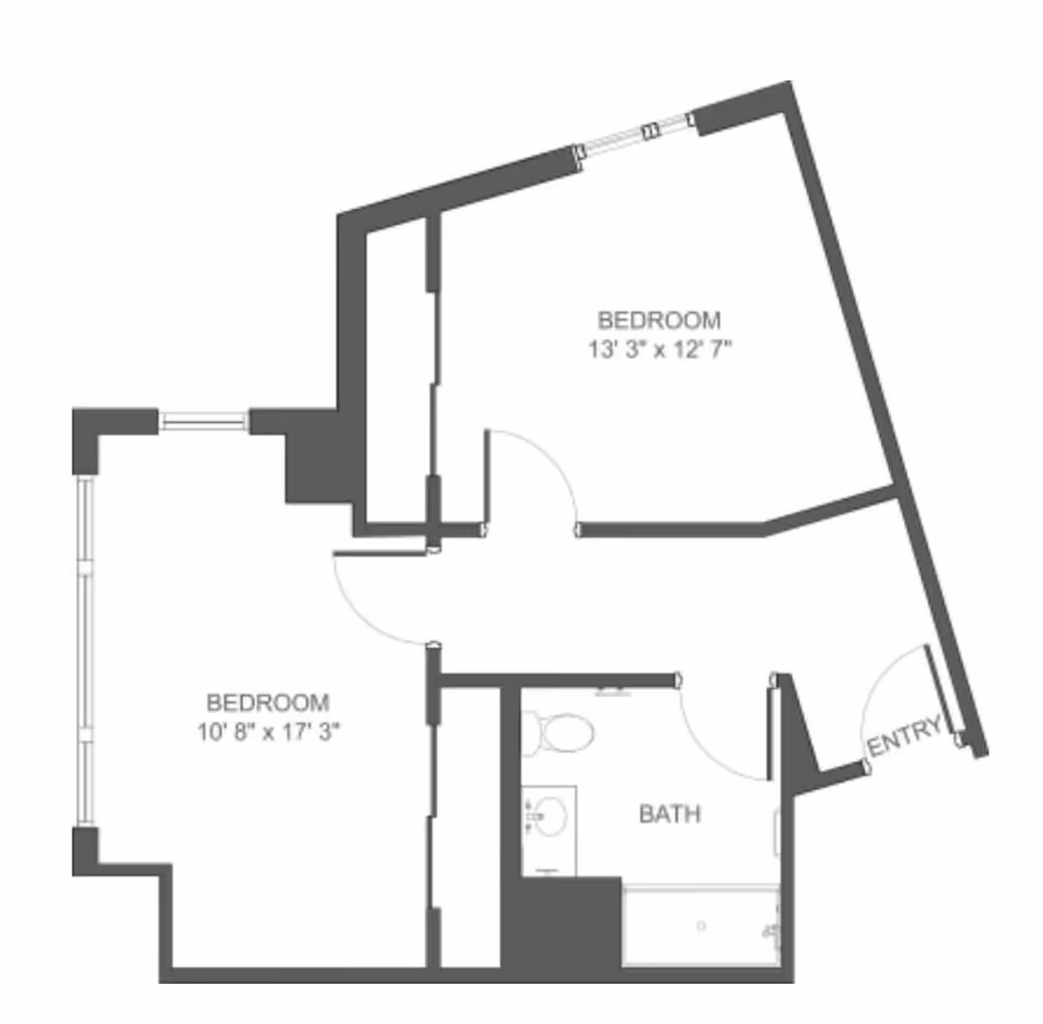 Architectural floor plan showing two bedrooms, a bathroom, and an entry area. The larger bedroom measures 10 feet 8 inches by 17 feet 3 inches, and the smaller bedroom measures 13 feet 3 inches by 12 feet 7 inches. The bathroom includes a toilet, sink, and bathtub.