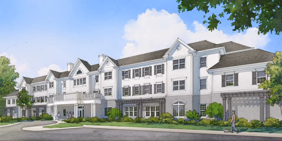 Illustration of a large three-story senior living facility building with white siding and gray roof, surrounded by greenery and trees under a blue sky with clouds. A person is walking a small dog on the sidewalk in front of the building.