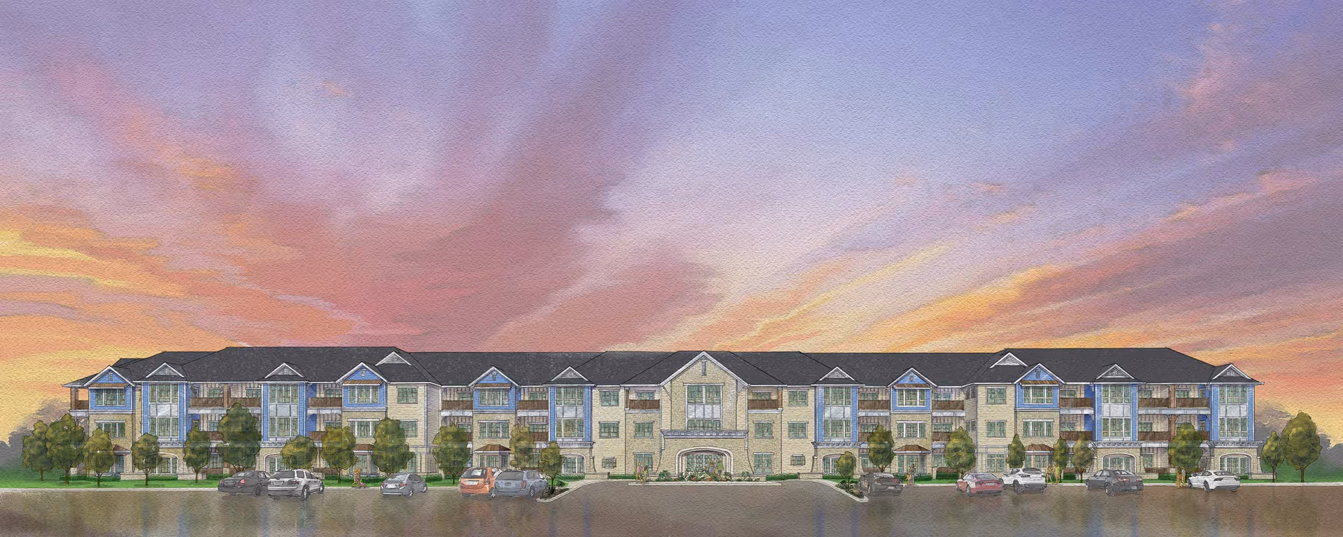 Front exterior rendering of a long three-story senior living building with balconies, landscaping and parked cars beneath a colorful sunset sky.