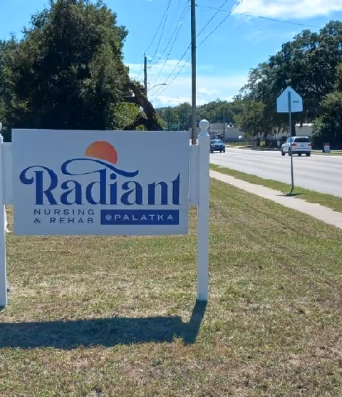 Sign for Radiant Nursing and Rehab at Palatka located near a road.