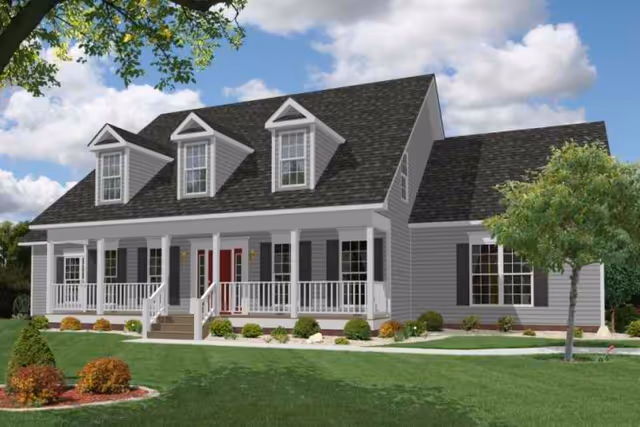 Gray single-family house with a front porch, three dormer windows, and a landscaped lawn under a partly cloudy sky.