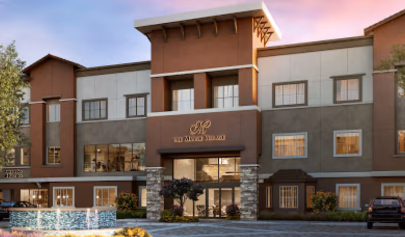 Exterior view of The Manor Village at Desert Ridge, front entrance and landscaping.