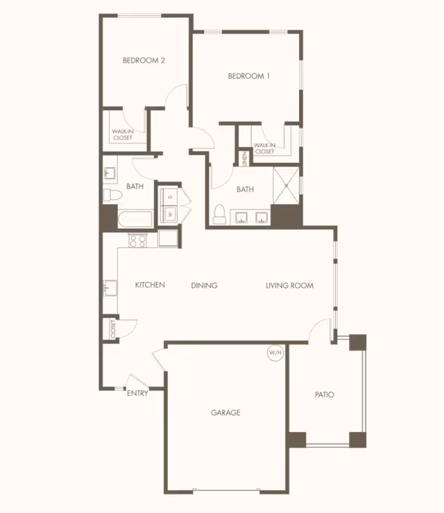 Floor plan of a residential unit at Revel Lodi showing two bedrooms, two bathrooms, kitchen, dining area, living room, garage, and patio. Bedroom 1 has a walk-in closet and an attached bathroom with double sinks. Bedroom 2 also has a walk-in closet and is near the second bathroom. The kitchen is adjacent to the dining and living room areas. The garage is accessible from the entry area, and there is a patio connected to the living room.