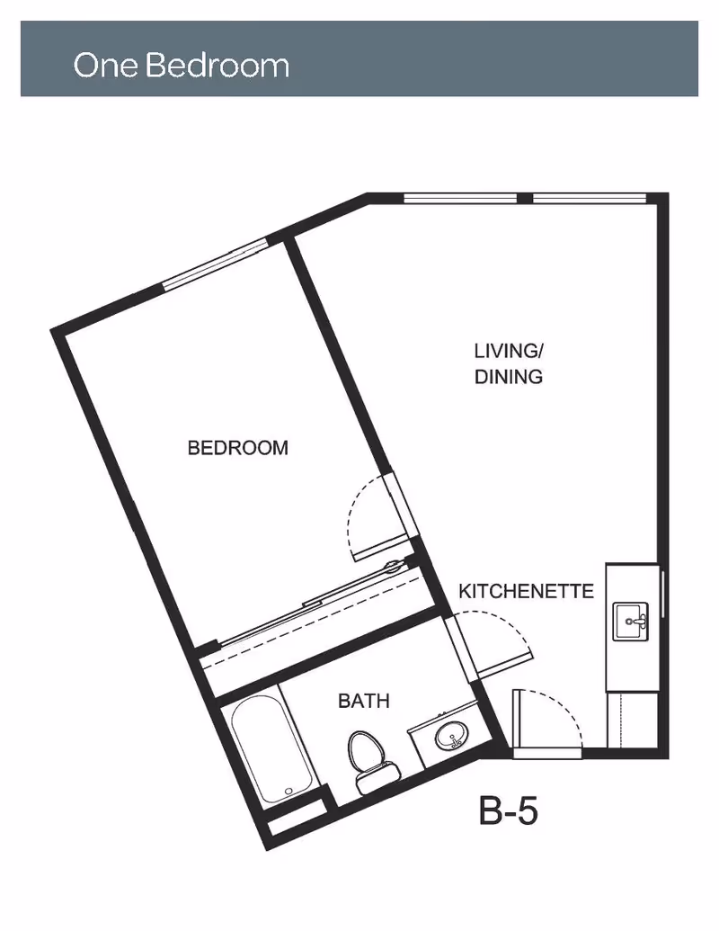 Floor plan of a one-bedroom apartment labeled B-5, showing a bedroom, bath with bathtub, toilet, and sink, a living/dining area, and a kitchenette with a sink.