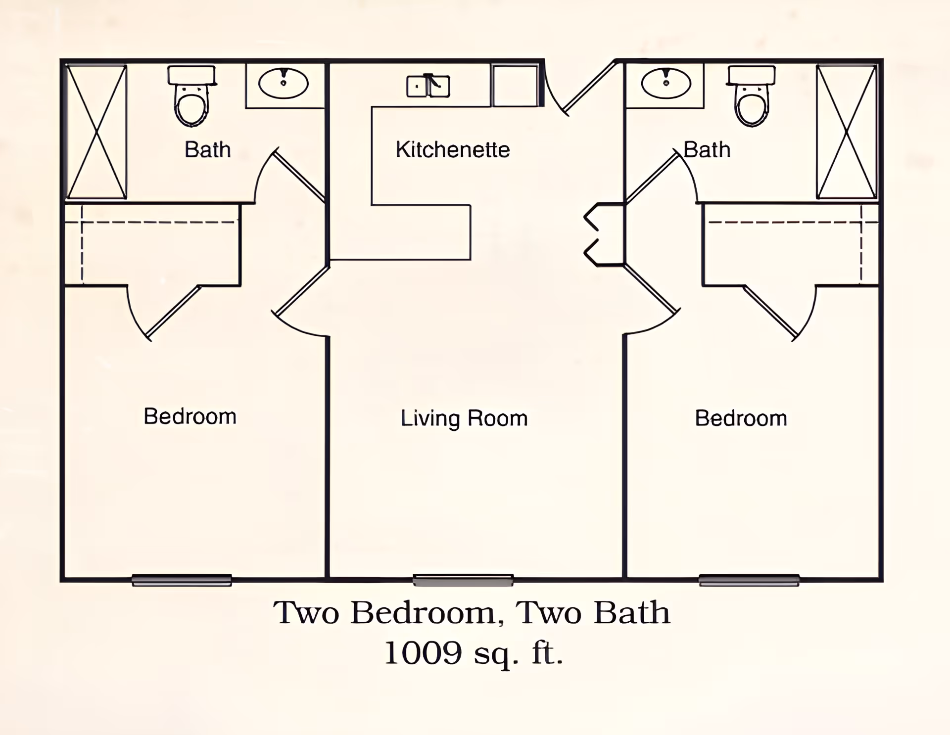 Floor plan of a two-bedroom, two-bath apartment with a living room and kitchenette, totaling 1009 square feet. Each bedroom has an attached bathroom and closet space.