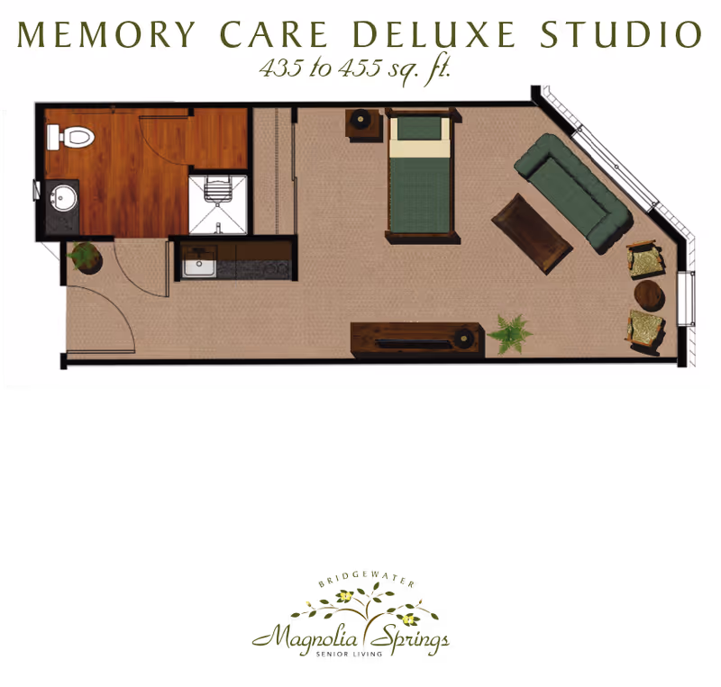 Floor plan of a Memory Care Deluxe Studio apartment measuring 435 to 455 square feet, featuring a bathroom with toilet, sink, and shower, a sleeping area with a bed, and a living area with a sofa, coffee table, two chairs, and a TV stand with a plant. The layout includes a small kitchenette area near the entrance.