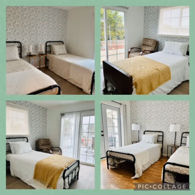Collage of four images showing a bedroom with two single beds. The room has patterned wallpaper on one wall, light-colored bedding with beige and yellow blankets, bedside tables with lamps, and a comfortable armchair. Large windows and a glass door lead to an outdoor patio area.