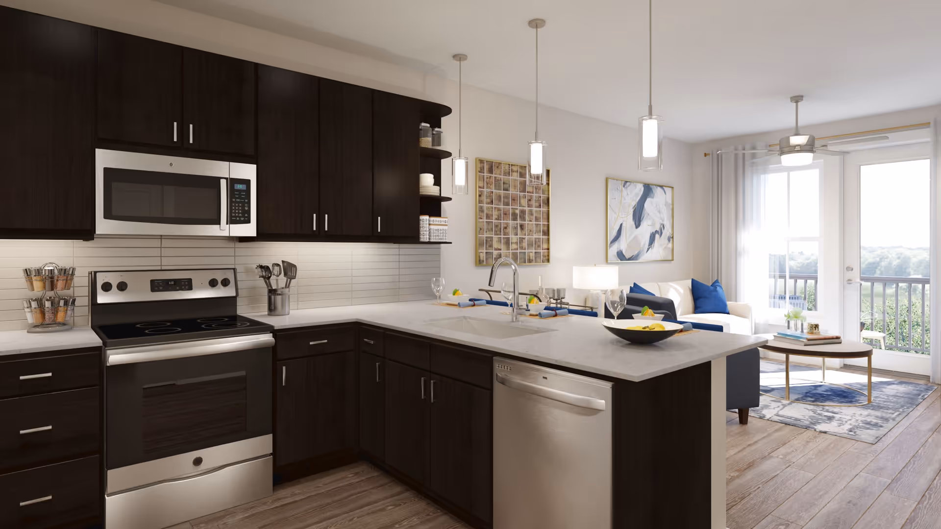 Modern kitchen with dark wood cabinets, stainless steel appliances including a microwave, stove, and dishwasher, a white countertop island with a sink and faucet, three pendant lights hanging above the island, and a view into a living room area with a white couch, blue pillows, a coffee table, and large windows with sheer curtains letting in natural light.