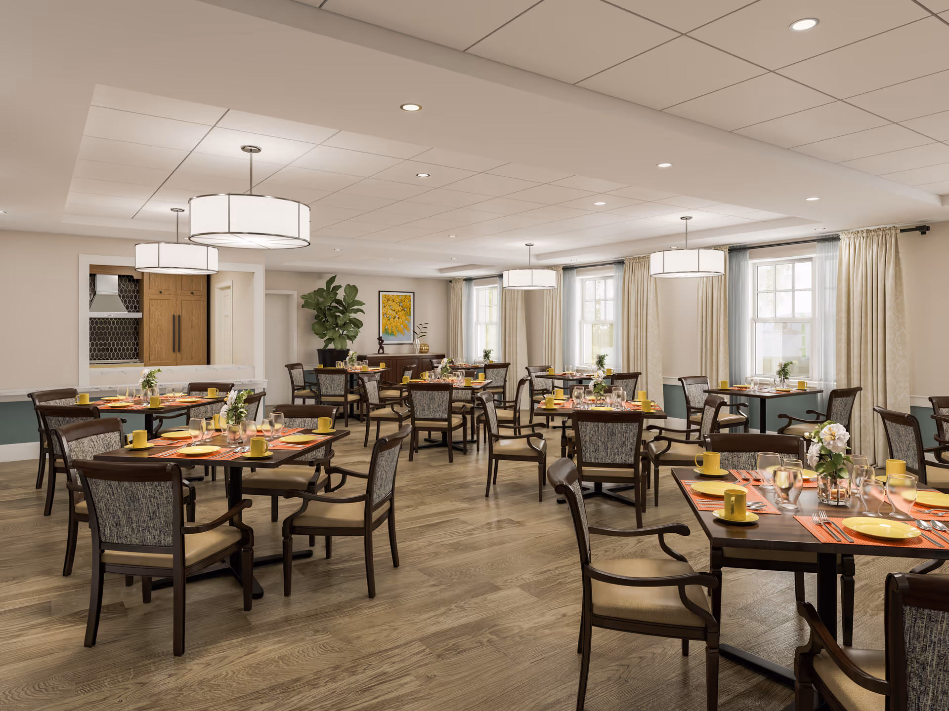 A spacious and well-lit dining room with multiple wooden tables and chairs arranged neatly. Each table is set with yellow plates, cups, glasses, and orange placemats. The room features large windows with cream-colored curtains, modern ceiling lights, and a wooden floor. There is a plant and framed artwork on the far wall.