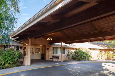 Exterior view of Valley West Health Care Center with a sheltered entrance.