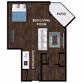 Floor plan of a senior living unit at Kipling Meadows Senior Living showing a combined bed and living room area with a bed, sofa, and TV, a kitchenette with a sink and microwave, and a patio area.
