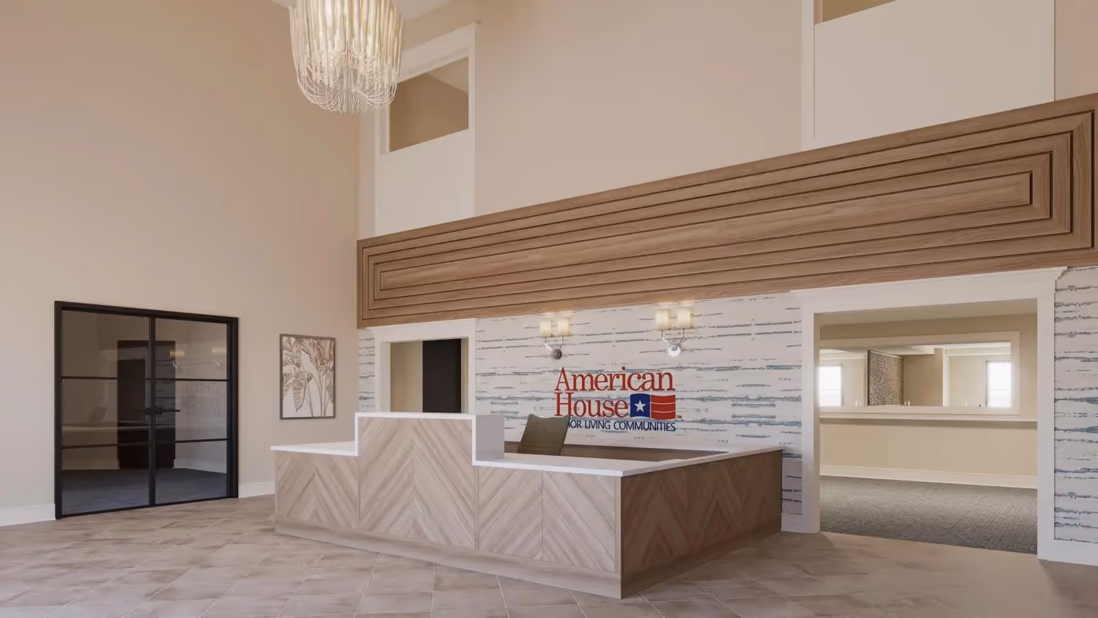 Reception area of American House Bonita Springs featuring a modern wooden front desk, a chandelier hanging from the ceiling, wall sconces, and a sign on the wall that reads 'American House Senior Living Communities'. The space has light-colored walls and tiled flooring.