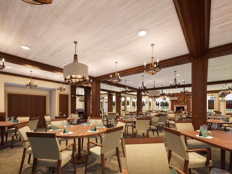 Spacious dining room with multiple round and rectangular tables, upholstered chairs, chandeliers, and a fireplace in the background.