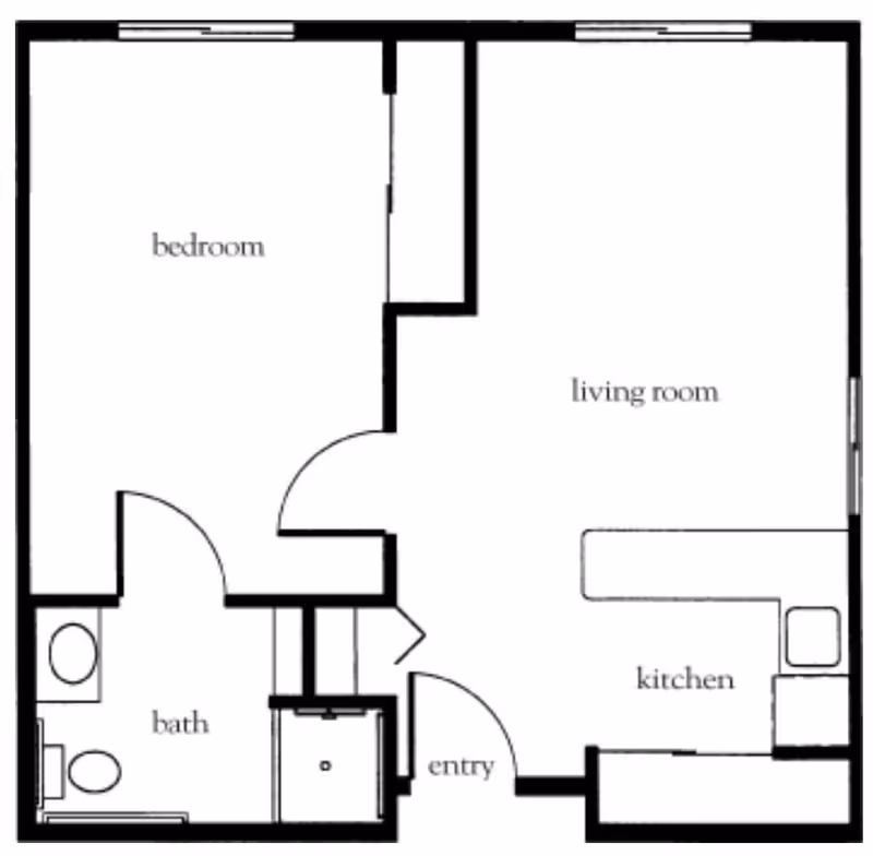 Floor plan of a one-bedroom apartment showing a bedroom, bathroom, living room, kitchen, and entry area.