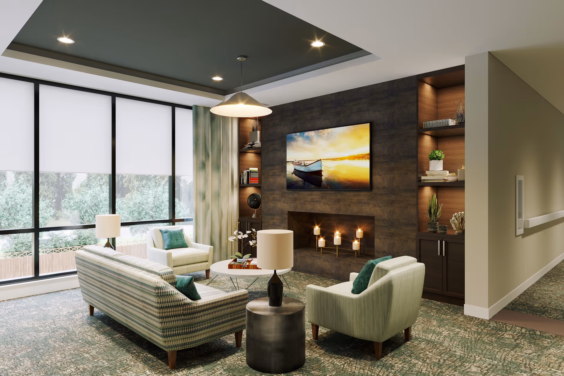 A cozy living room area with large windows covered by white roller shades, a patterned sofa, two armchairs with green cushions, a round coffee table, and a side table with a lamp. The room features a modern fireplace with lit candles and a large wall-mounted painting of a boat on water during sunset. Built-in wooden shelves with decorative items flank the fireplace, and the carpet has a green and beige pattern.