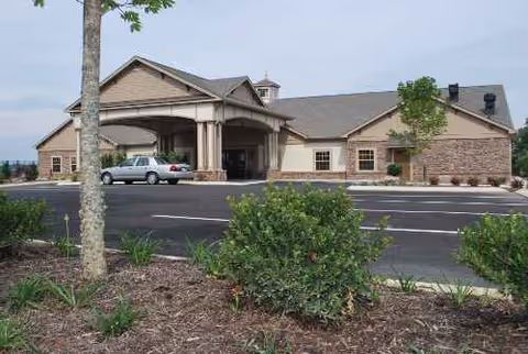 Exterior view of The Lantern at Morning Pointe Alzheimer's Center in Lenoir City, with driveway.