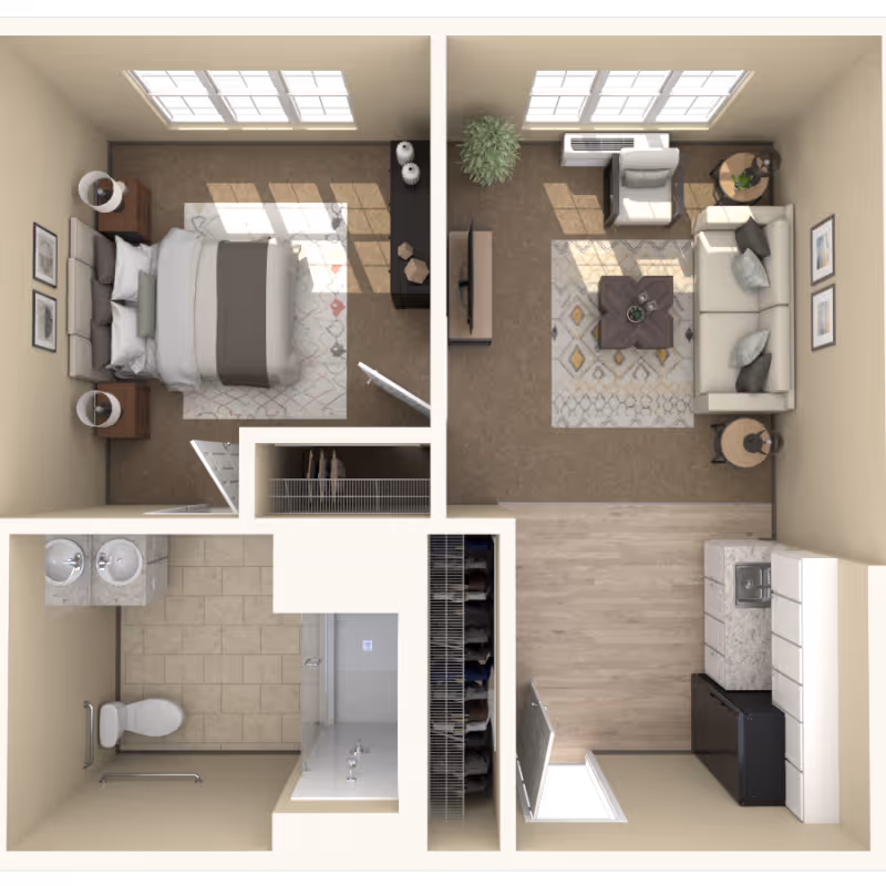 Top-down view of a senior living apartment floor plan showing a bedroom with a bed, two nightstands, and a rug; a living room with a sofa, armchair, coffee table, TV, and side tables; a kitchen with cabinets, a sink, and a refrigerator; and a bathroom with a toilet, double sink vanity, and a shower.