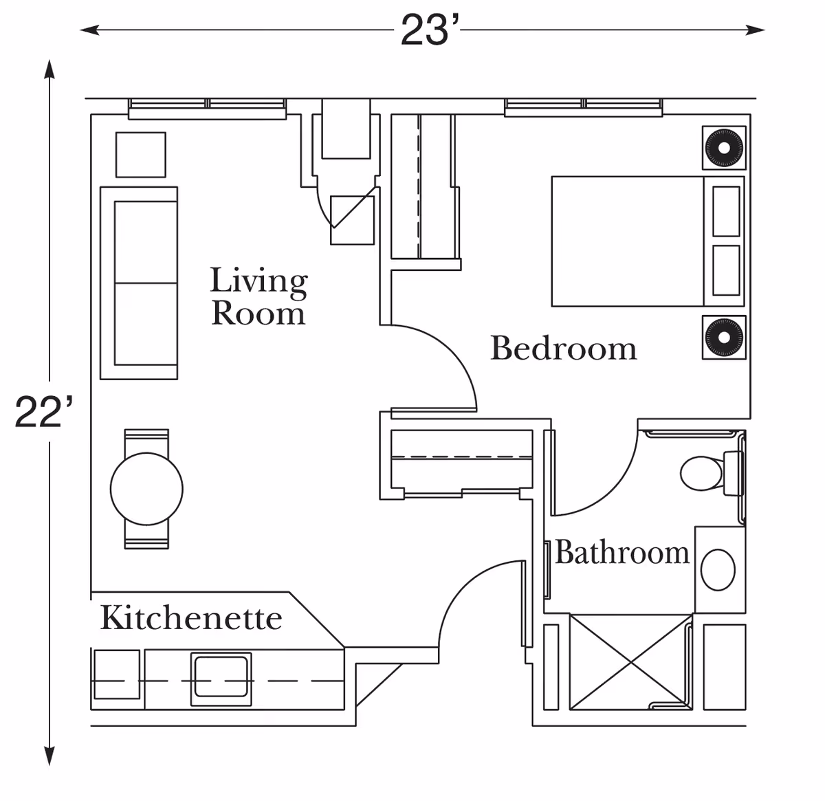 Architectural floor plan of a senior living unit at Heritage Woods of Watseka, showing a living room with sofa and table, a kitchenette with sink and counter, a bedroom with bed and nightstands, and a bathroom with toilet, sink, and shower. The overall dimensions are 23 feet by 22 feet.