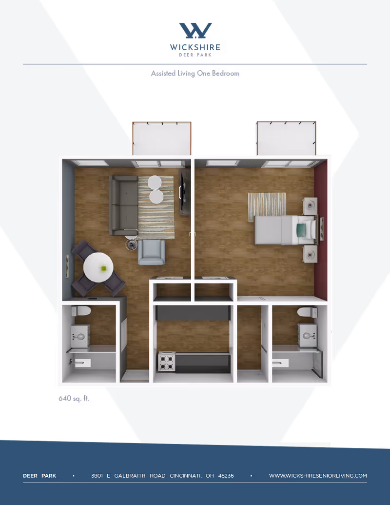 Floor plan of a one-bedroom assisted living apartment at Deer Park Assisted Living, showing a living room with sofa, armchair, TV, and dining table; a bedroom with a bed and nightstands; a kitchen with stove and counter space; and two bathrooms with sinks, toilets, and showers.