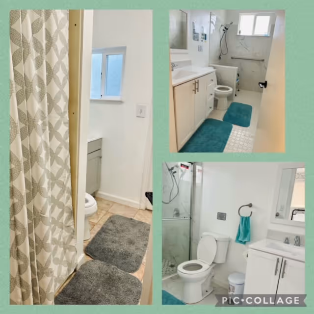Collage of three images showing different bathrooms. The first image shows a bathroom with a patterned shower curtain, a toilet, and gray bath mats on a tiled floor. The second image shows a bathroom with a white vanity, toilet, and a walk-in shower with a handheld showerhead, blue bath mats, and a window. The third image shows a bathroom with a white vanity, toilet, glass-enclosed shower, and a teal towel hanging on a ring, with a small trash can on the floor.